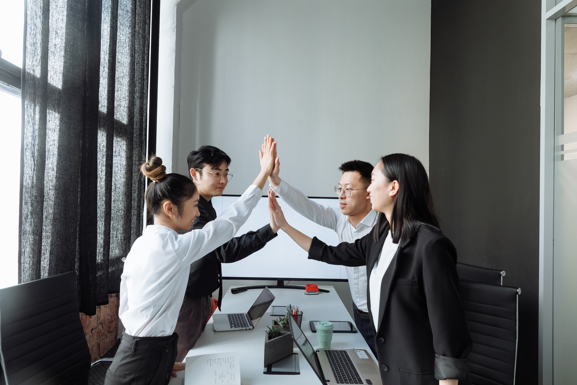 A Group of People Having a Meeting in the Office